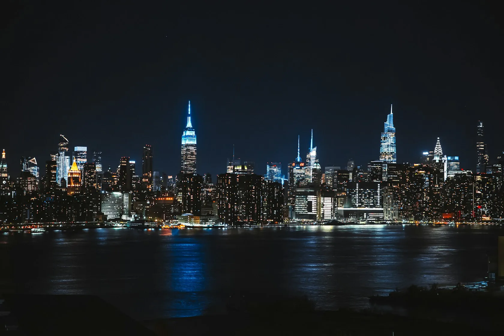 A financial-district skyline at night